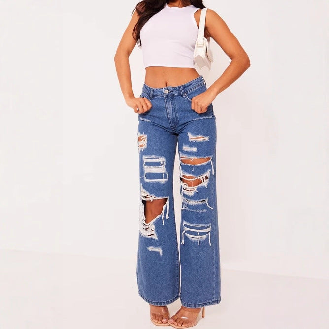 Vaqueros desgastados de color liso